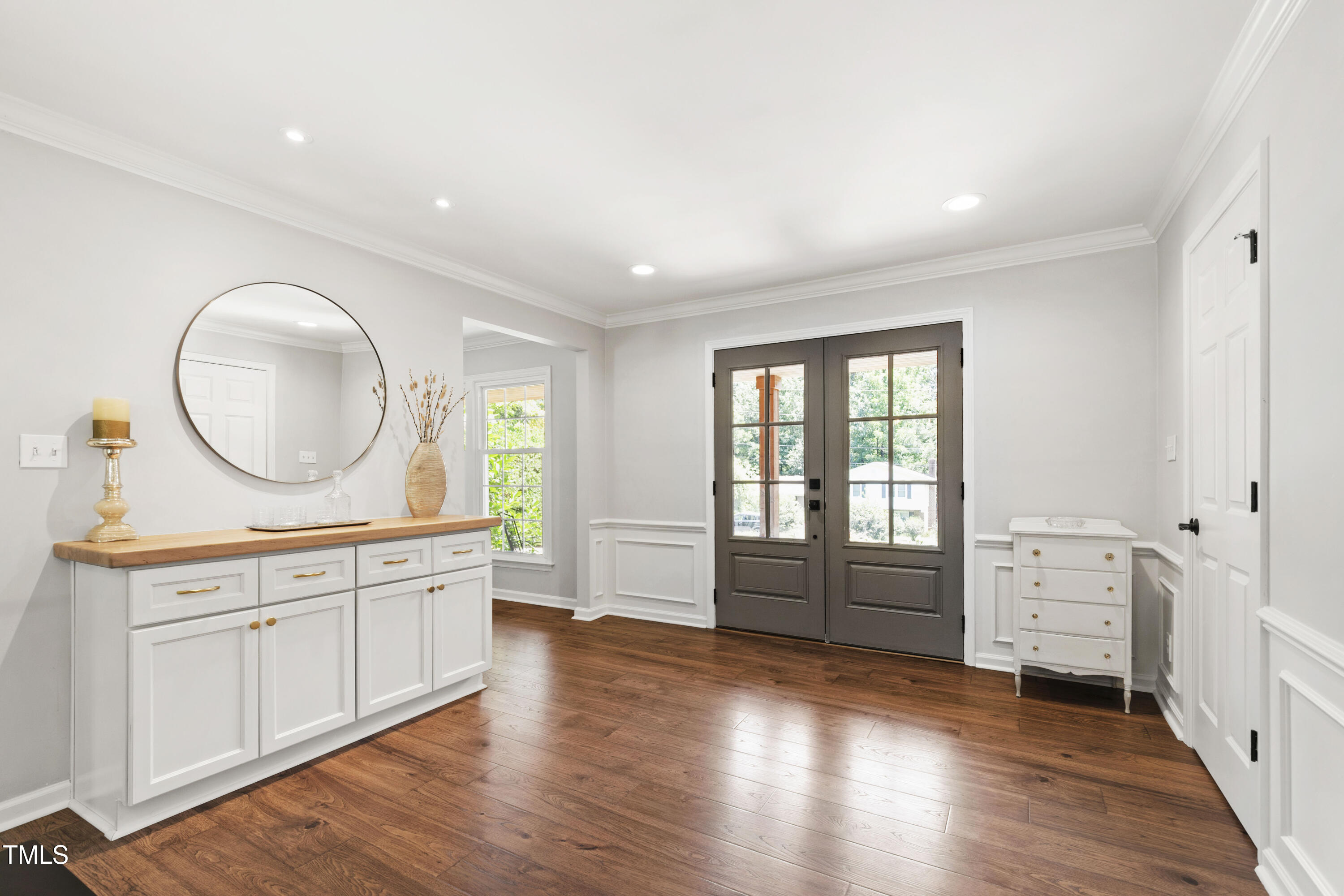 3209 Caldwell Drive Raleigh, NC 27607 - Photo 6 of 42 wooden floor in an empty room with a window and wooden floor