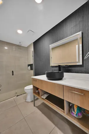 a bathroom with a sink and a toilet