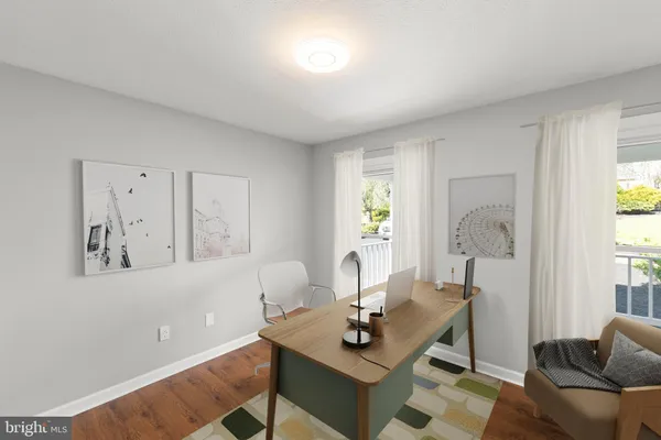 a kitchen with a sink a stove top oven a counter space and cabinets