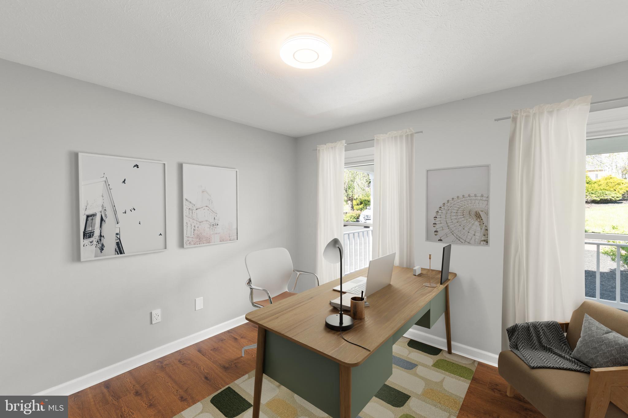 405 Spring Hollow Road Woodstock, VA 22664 - Photo 14 of 98 a workspace with furniture and window