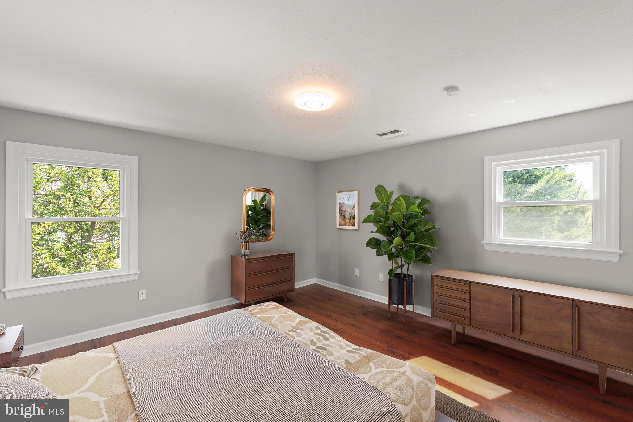 405 Spring Hollow Road Woodstock, VA 22664 - Photo 16 of 98 a bedroom with a bed and a window