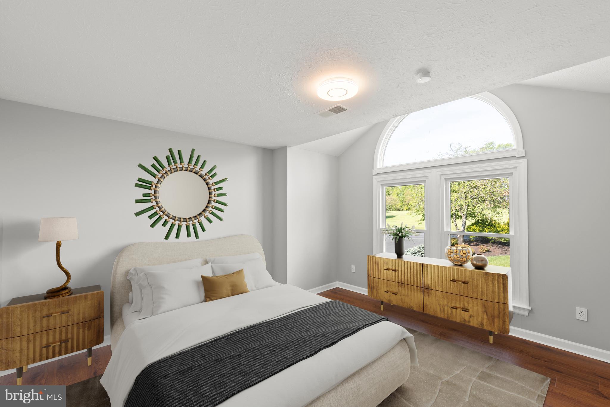 405 Spring Hollow Road Woodstock, VA 22664 - Photo 17 of 98 a bedroom with a bed and a large window