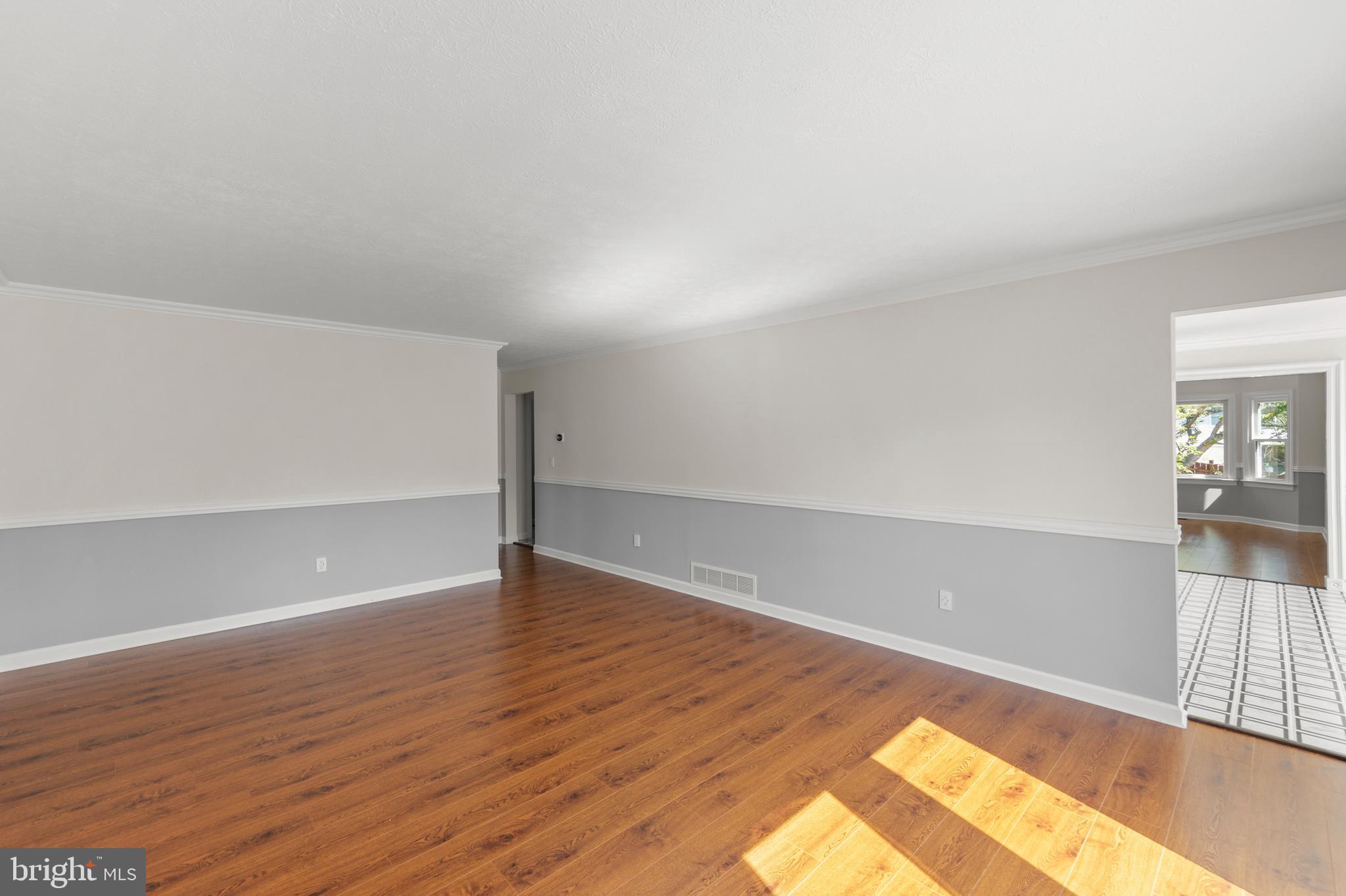 405 Spring Hollow Road Woodstock, VA 22664 - Photo 40 of 98 a view of an empty room and wooden floor