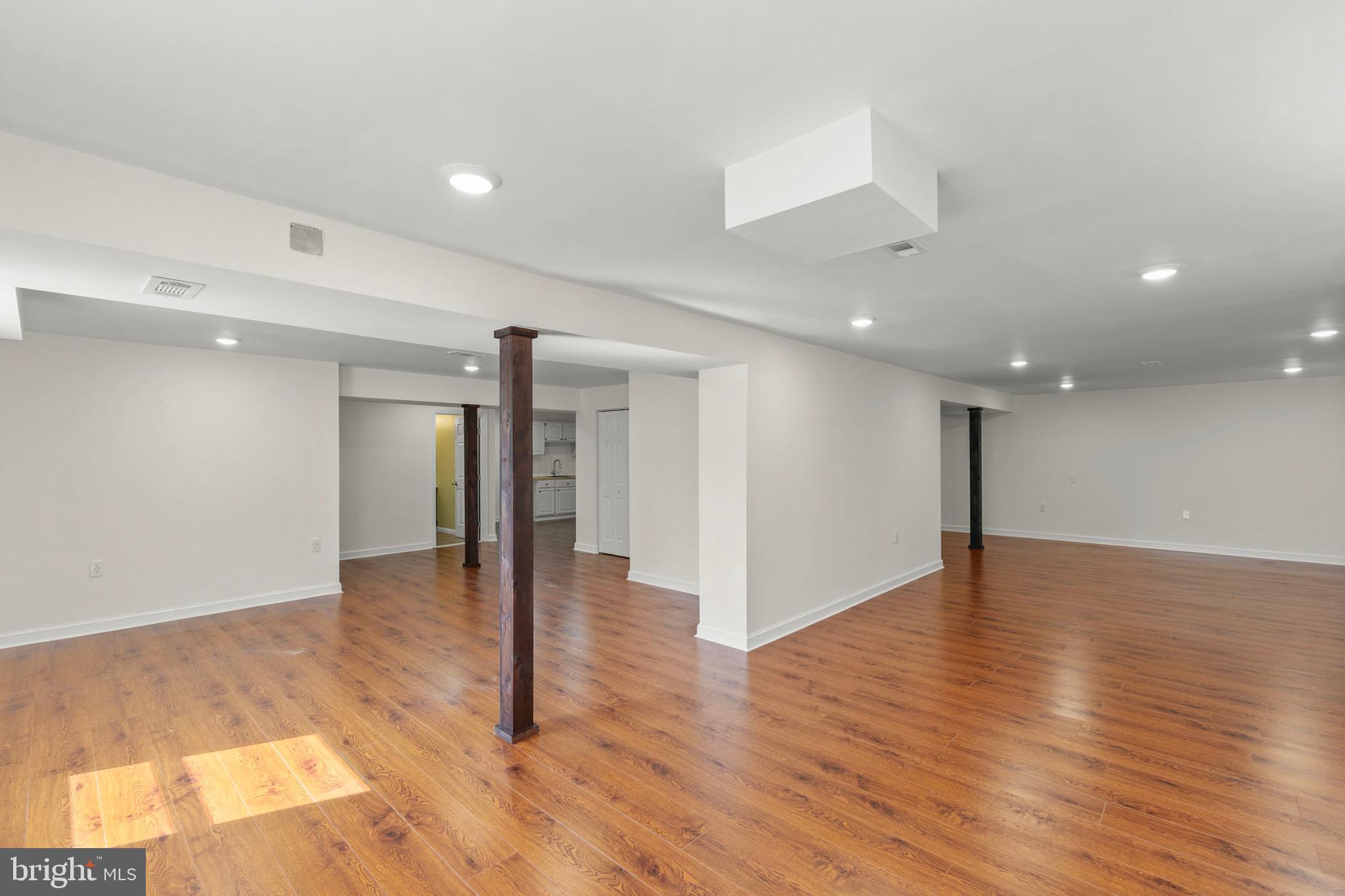 405 Spring Hollow Road Woodstock, VA 22664 - Photo 72 of 98 a view of an empty room with wooden floor