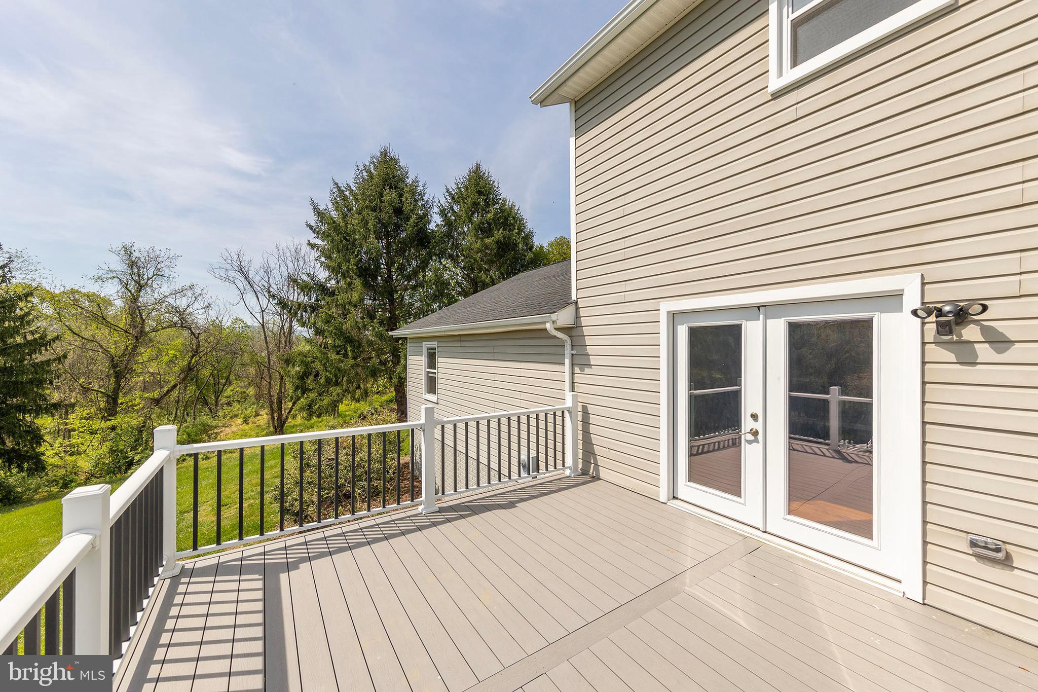 405 Spring Hollow Road Woodstock, VA 22664 - Photo 80 of 98 a view of a wooden deck