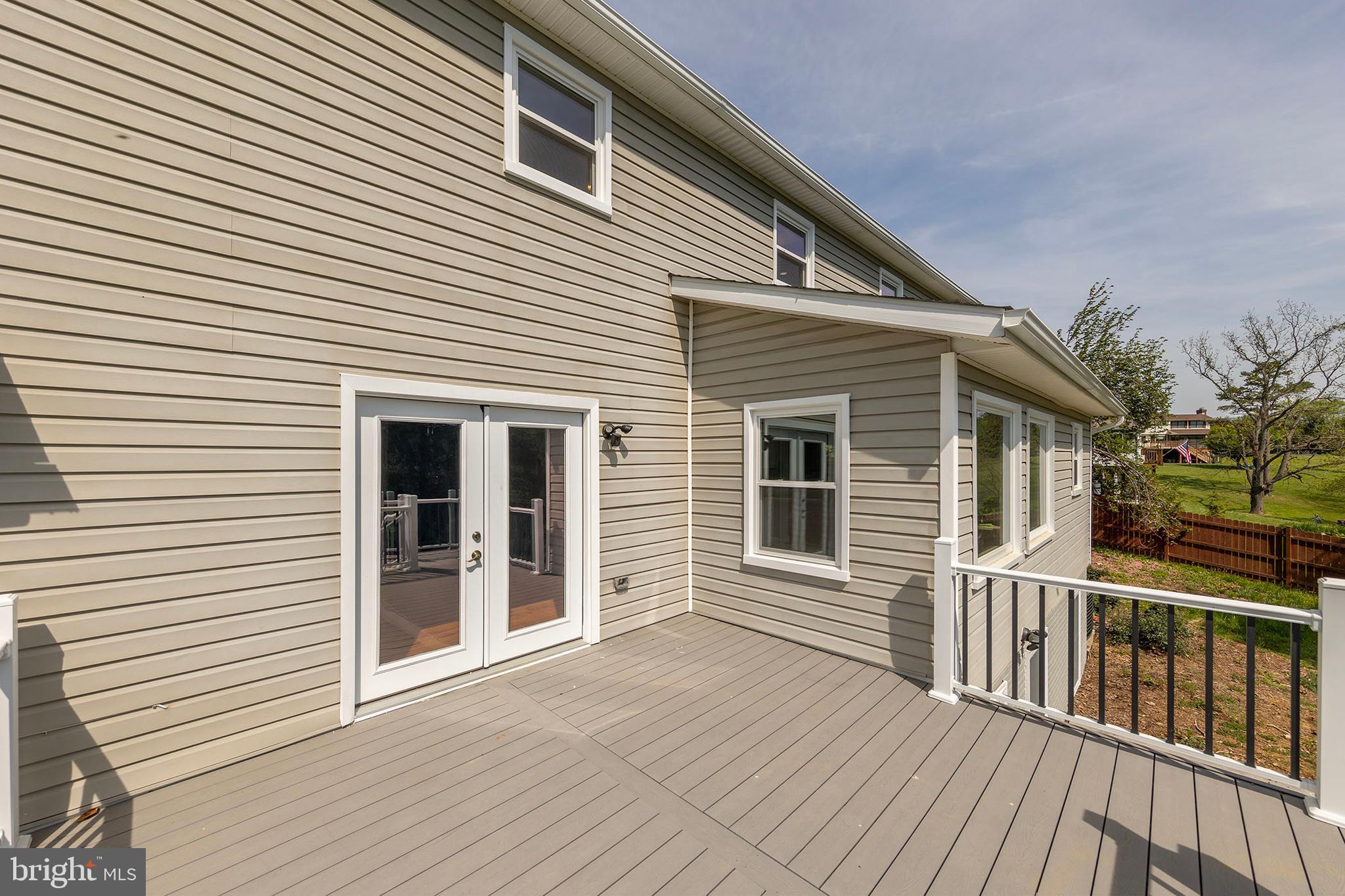 405 Spring Hollow Road Woodstock, VA 22664 - Photo 81 of 98 a view of a house with deck