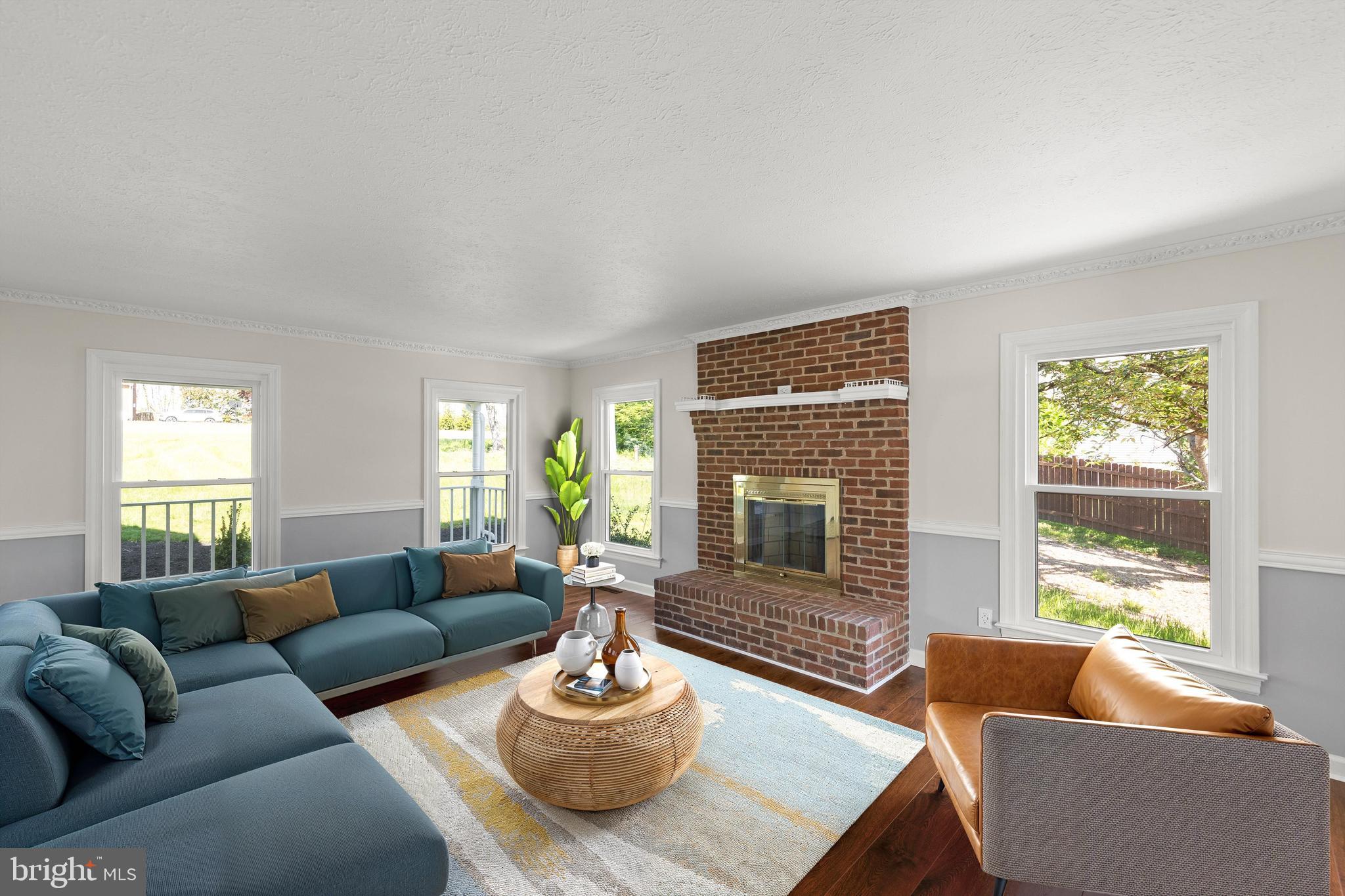 405 Spring Hollow Road Woodstock, VA 22664 - Photo 9 of 98 a living room with furniture and a large window