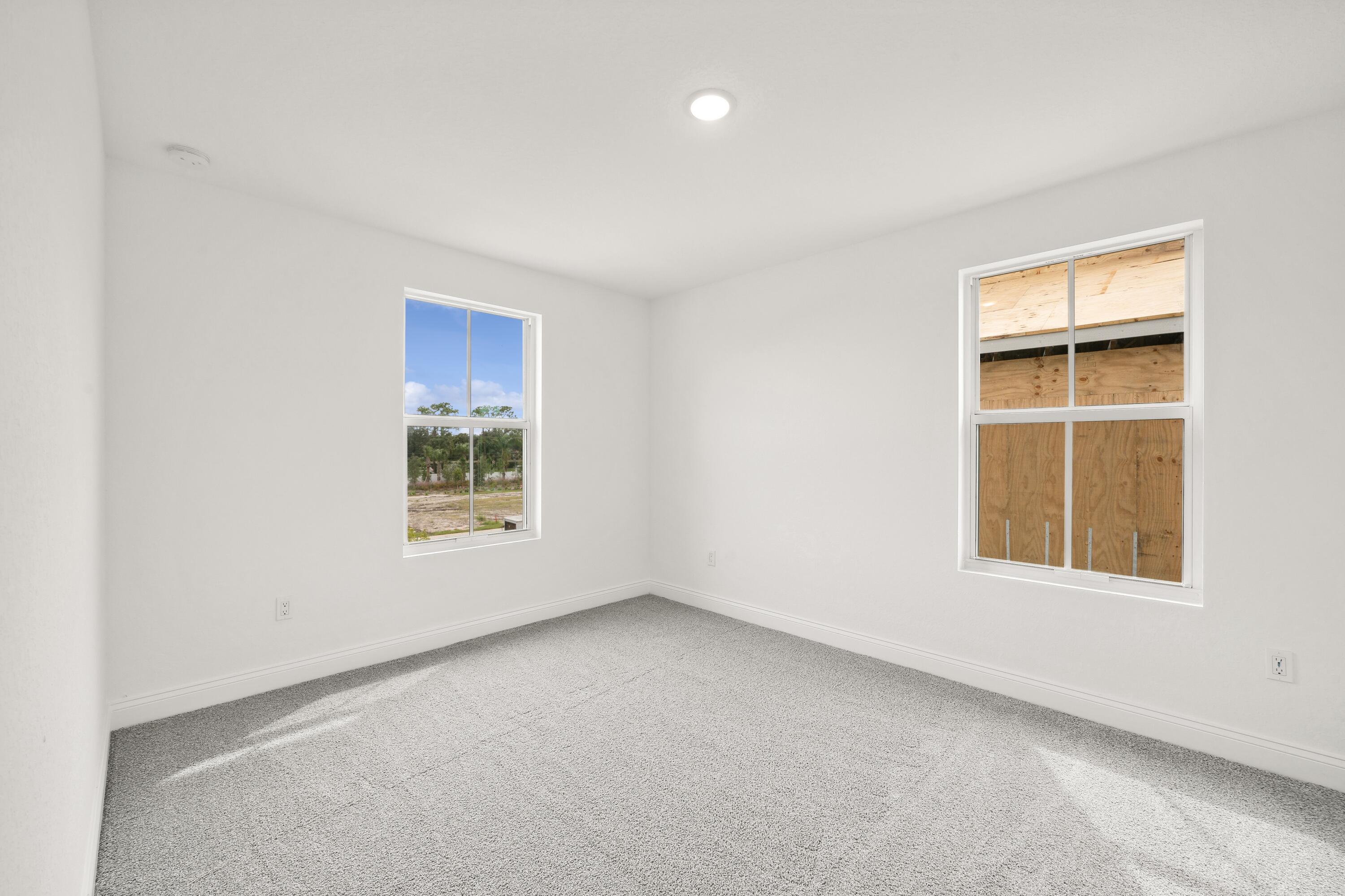 171 Southeast Birch Terrace, Unit 740 Stuart, FL 34997 - Photo 15 of 30 an empty room with a window