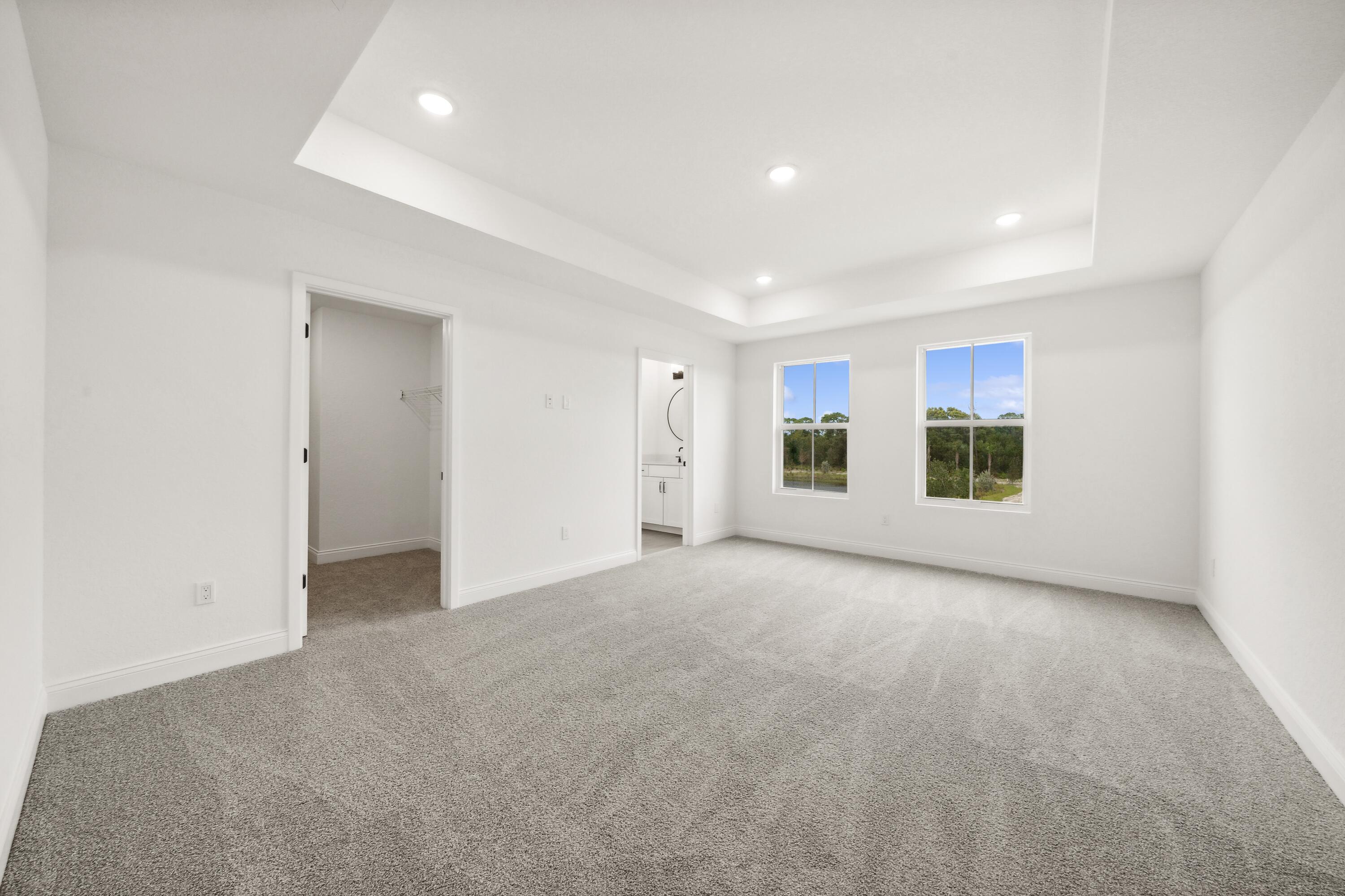171 Southeast Birch Terrace, Unit 740 Stuart, FL 34997 - Photo 22 of 30 a view of empty room with windows