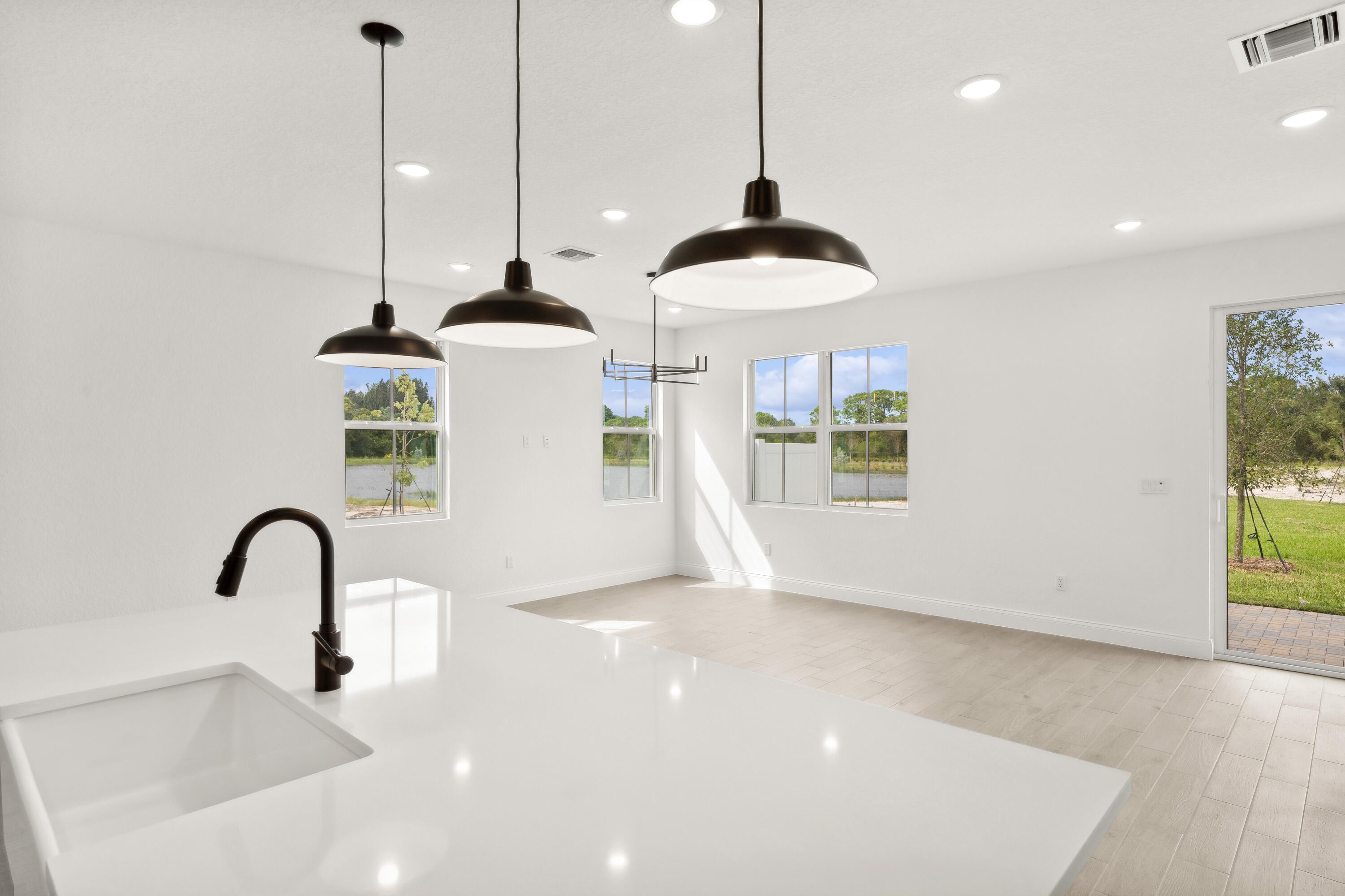 171 Southeast Birch Terrace, Unit 740 Stuart, FL 34997 - Photo 7 of 30 a very nice looking room with a large window and furniture