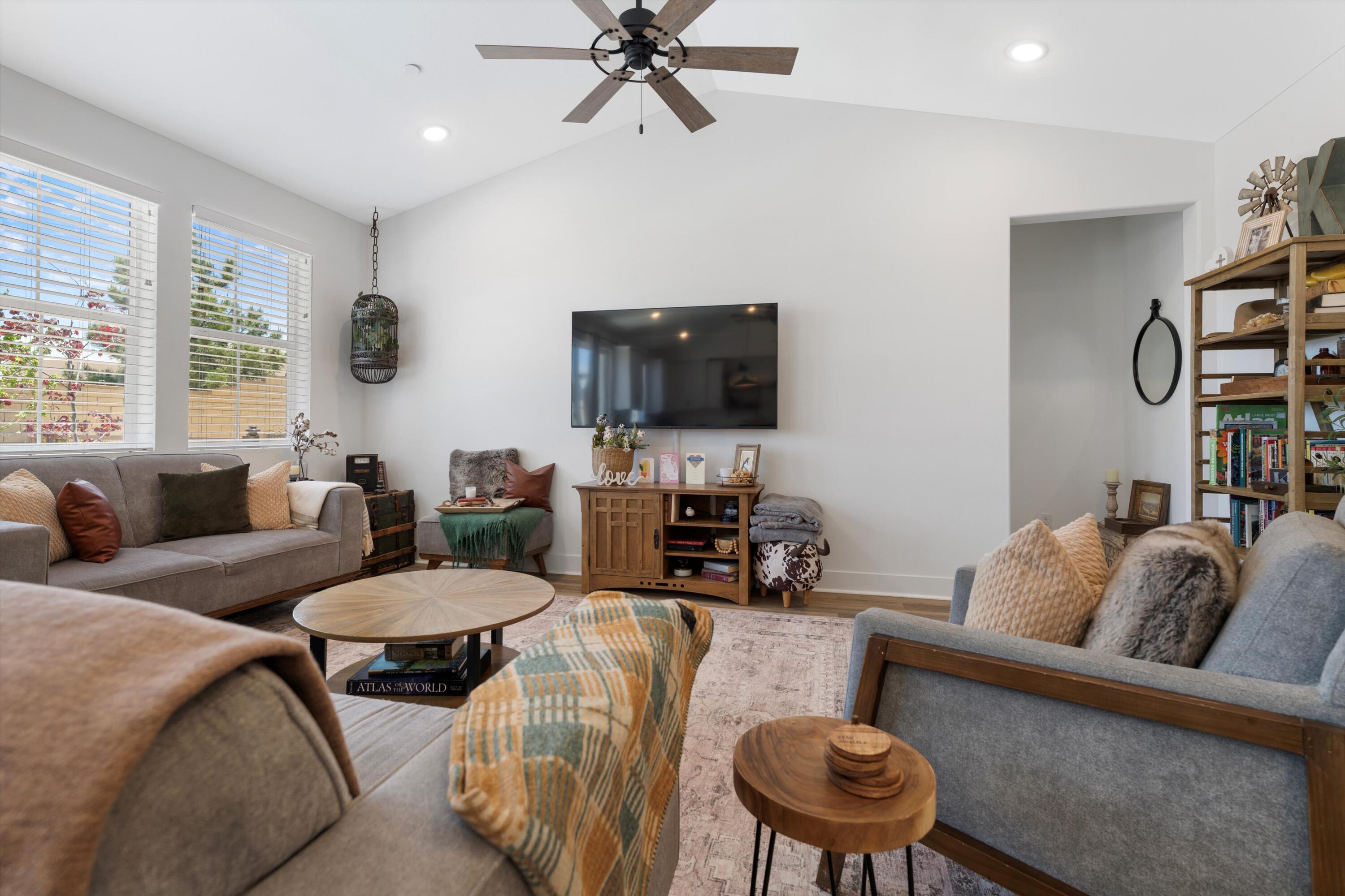 1344 Bodega Drive Tehachapi, CA 93561 - Photo 11 of 34 a living room with furniture and a flat screen tv
