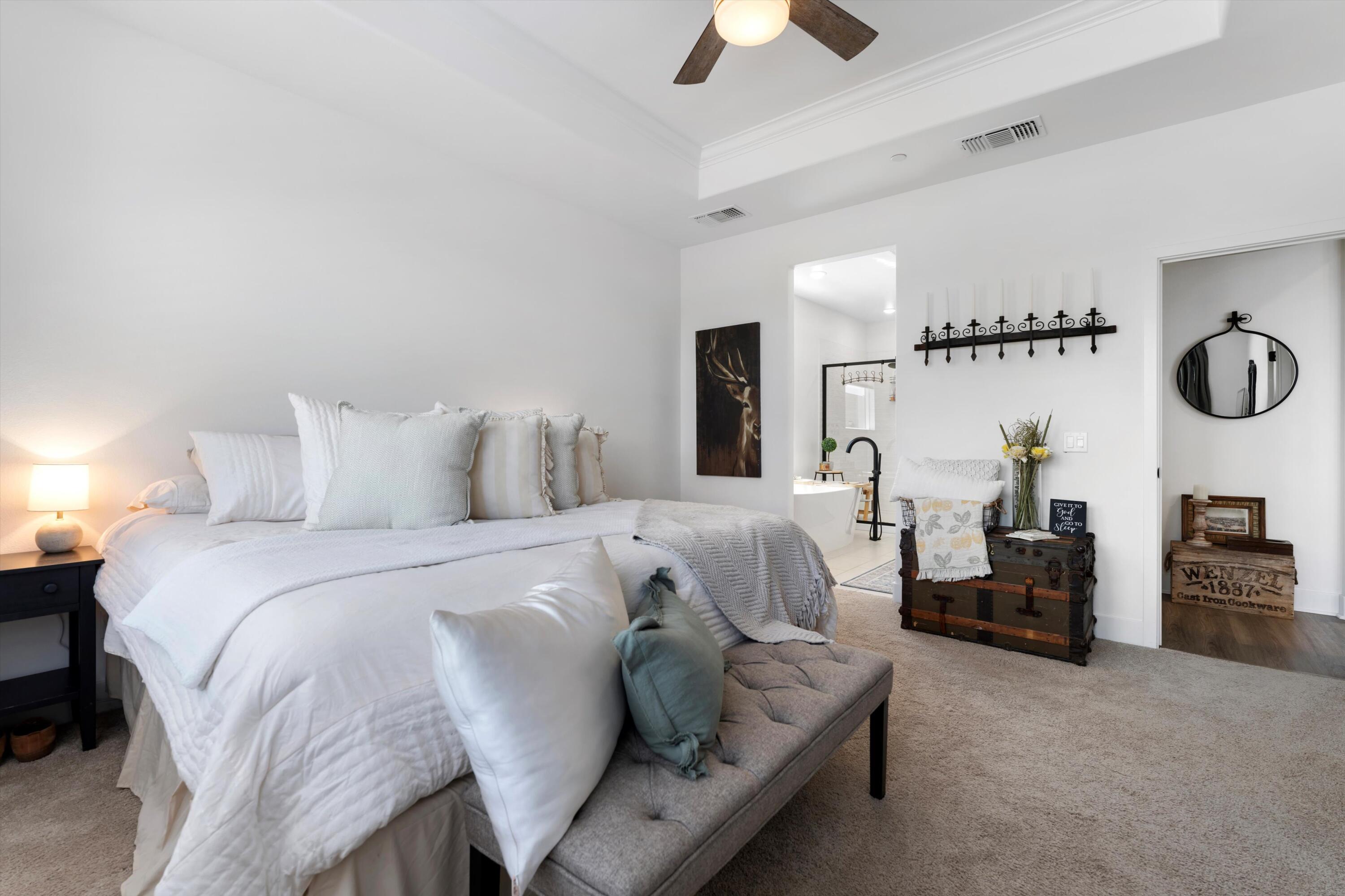 1344 Bodega Drive Tehachapi, CA 93561 - Photo 21 of 34 a bedroom with a bed couches and a fireplace with wooden floor