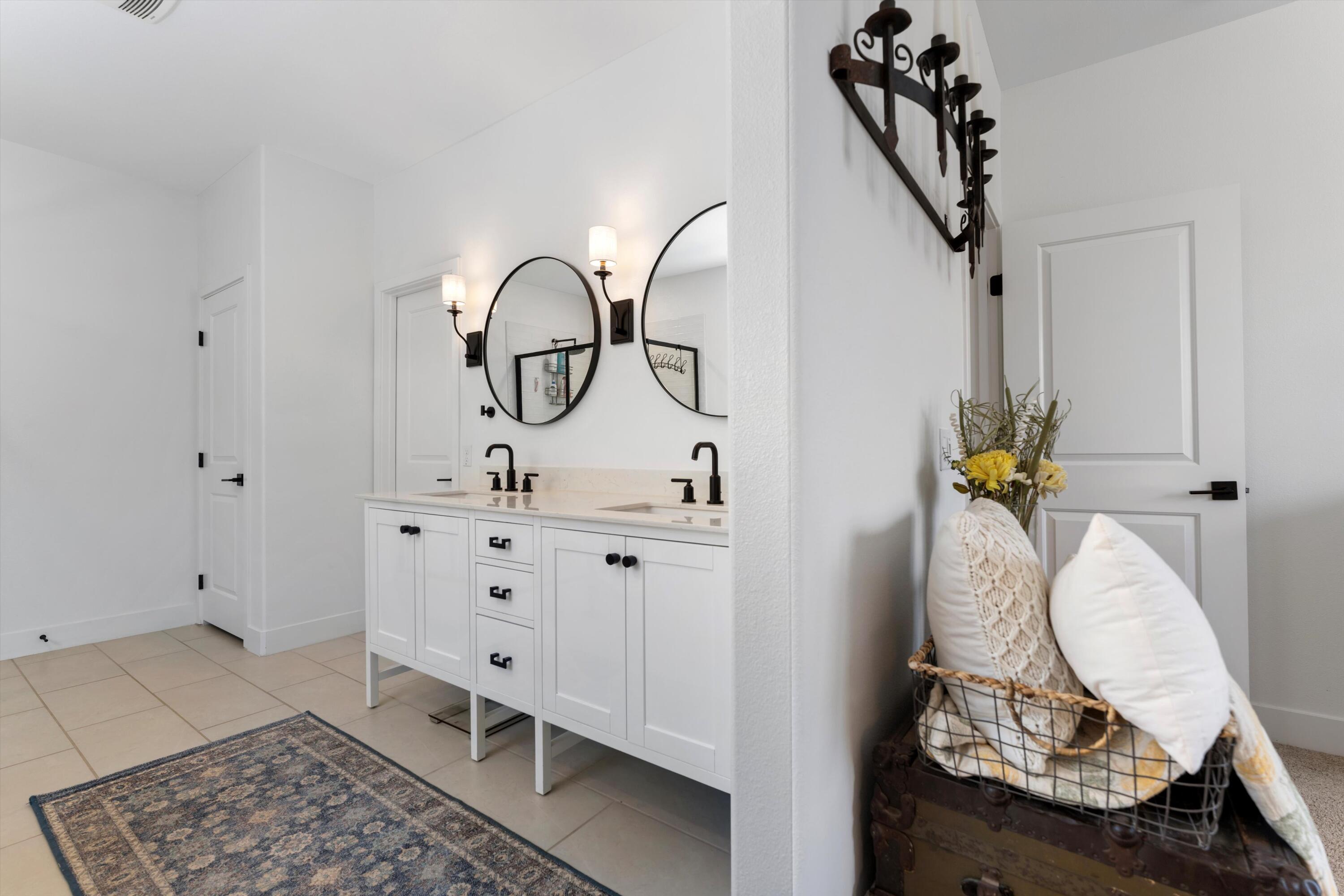 1344 Bodega Drive Tehachapi, CA 93561 - Photo 22 of 34 a bathroom with a sink and mirror