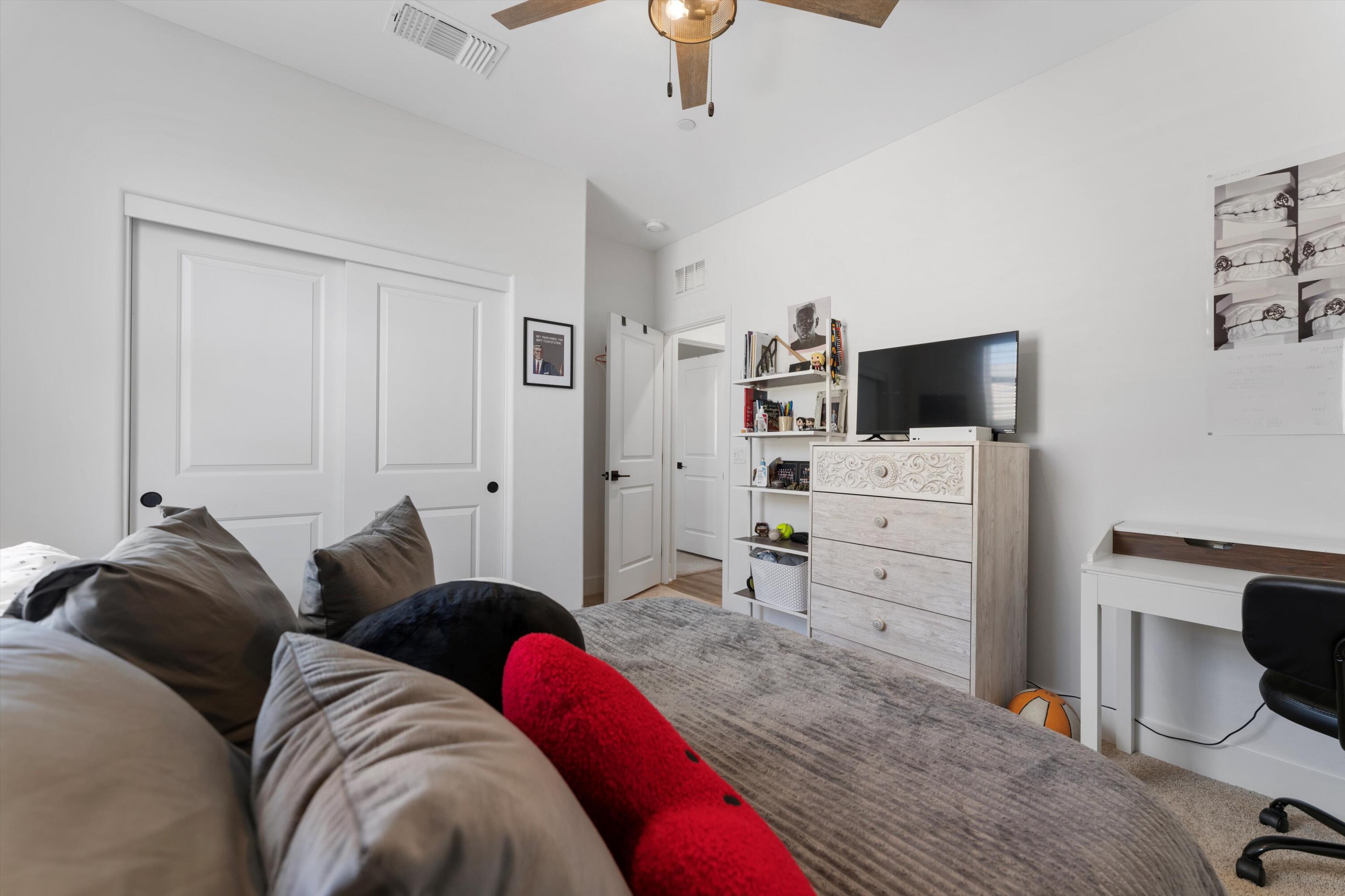 1344 Bodega Drive Tehachapi, CA 93561 - Photo 27 of 34 a living room with furniture and a flat screen tv