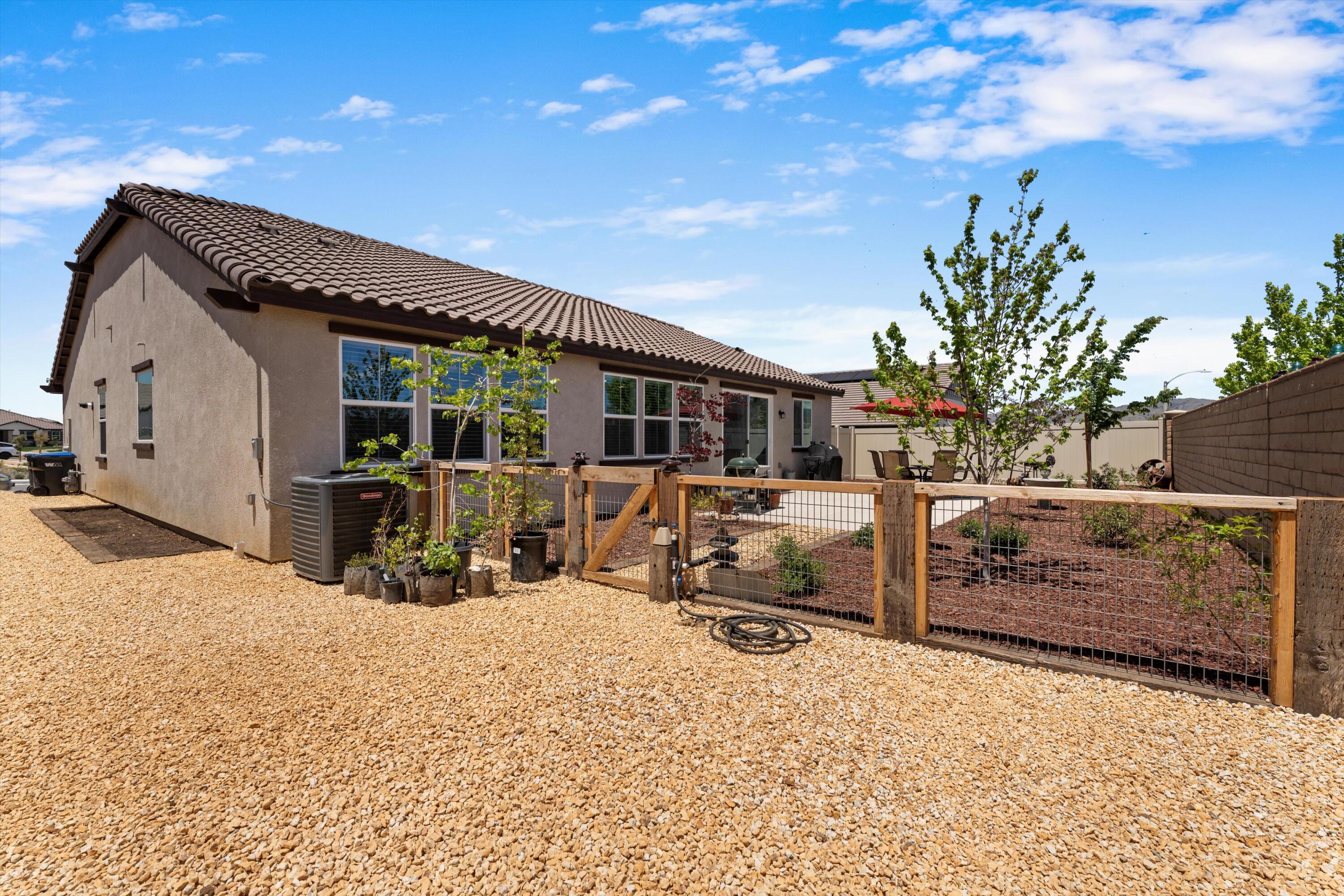1344 Bodega Drive Tehachapi, CA 93561 - Photo 33 of 34 a view of a house with a patio