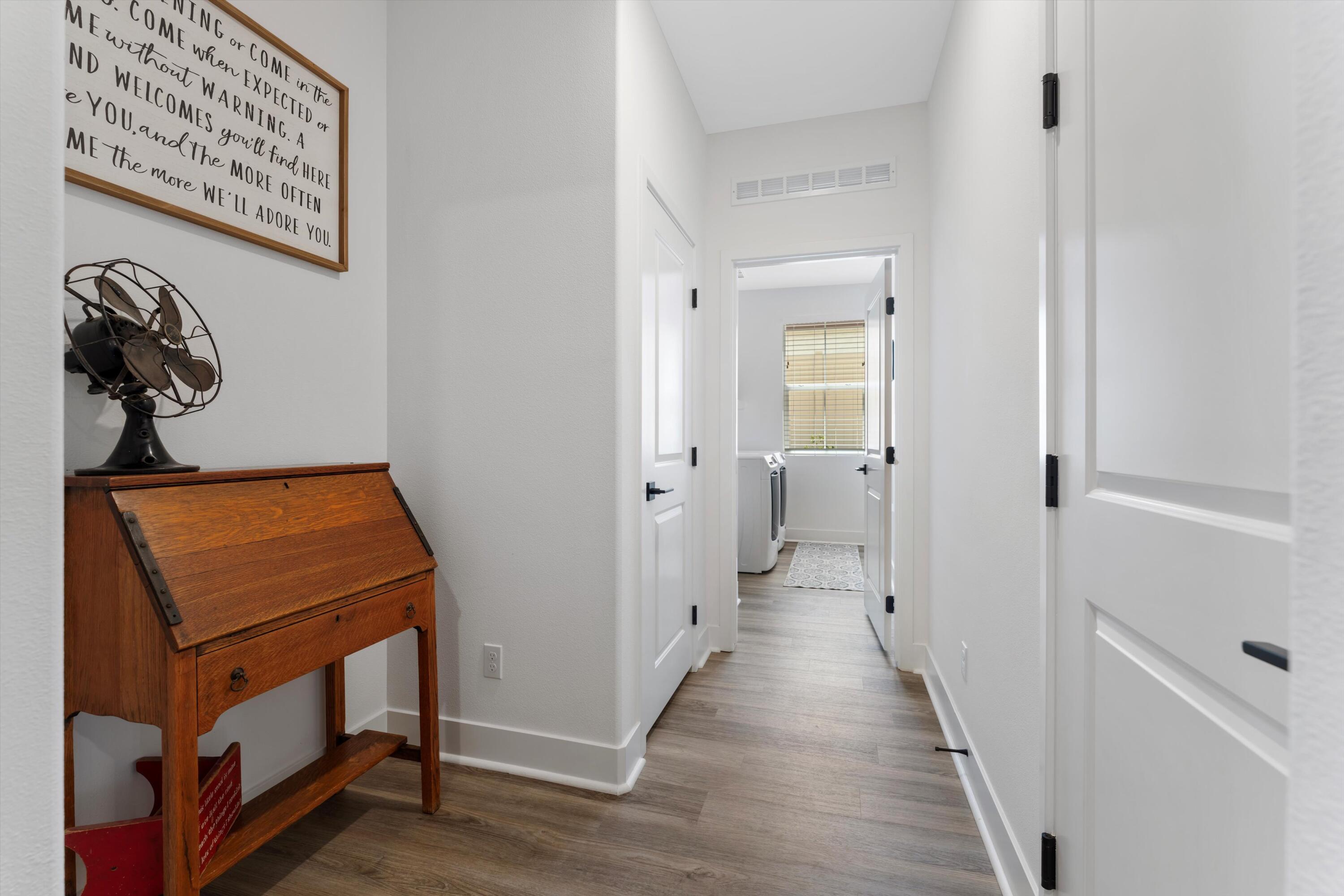1344 Bodega Drive Tehachapi, CA 93561 - Photo 8 of 34 a view of a hallway with wooden floor
