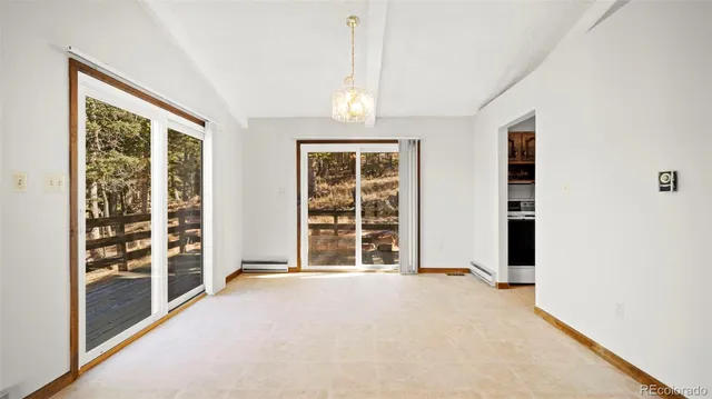 a kitchen with a stove and a microwave