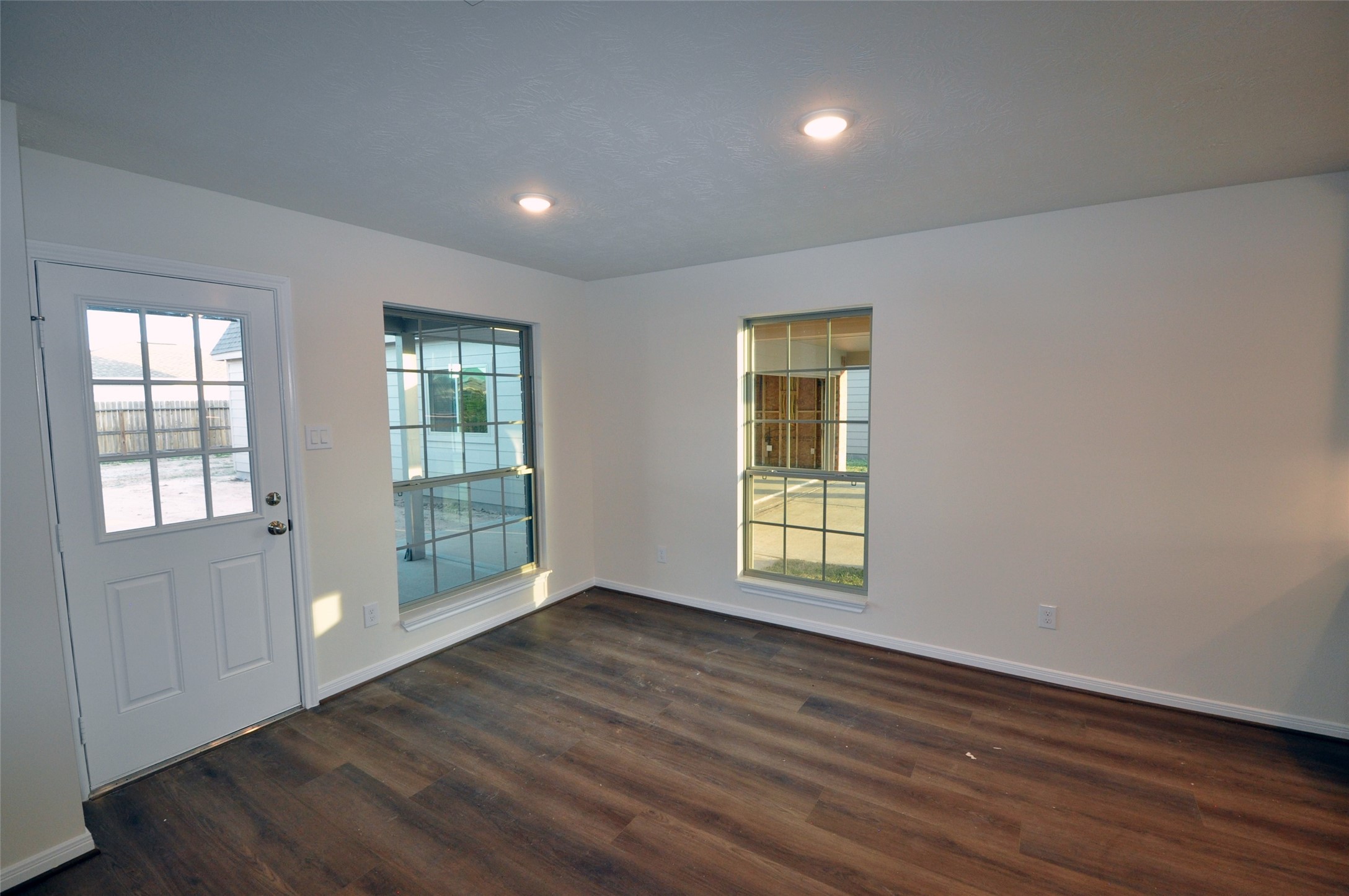 3701 Pedregal Road League City, TX 77573 - Photo 18 of 48 an empty room with wooden floor and windows
