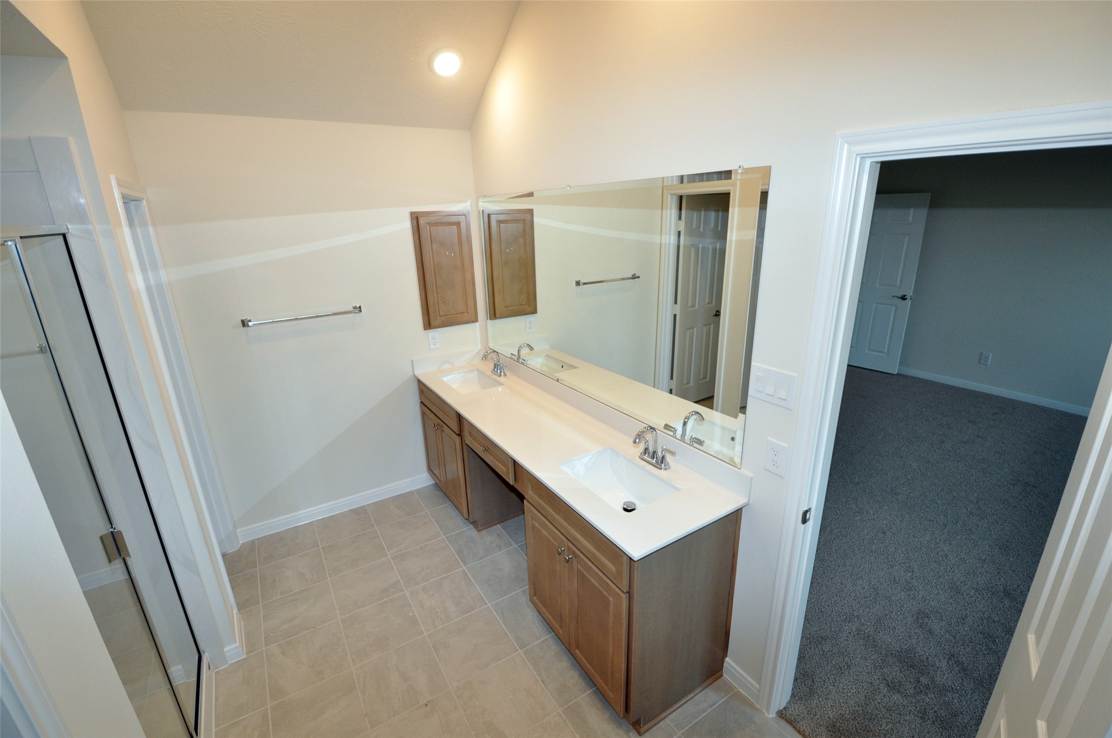 3701 Pedregal Road League City, TX 77573 - Photo 21 of 48 a bathroom with a sink mirror and vanity