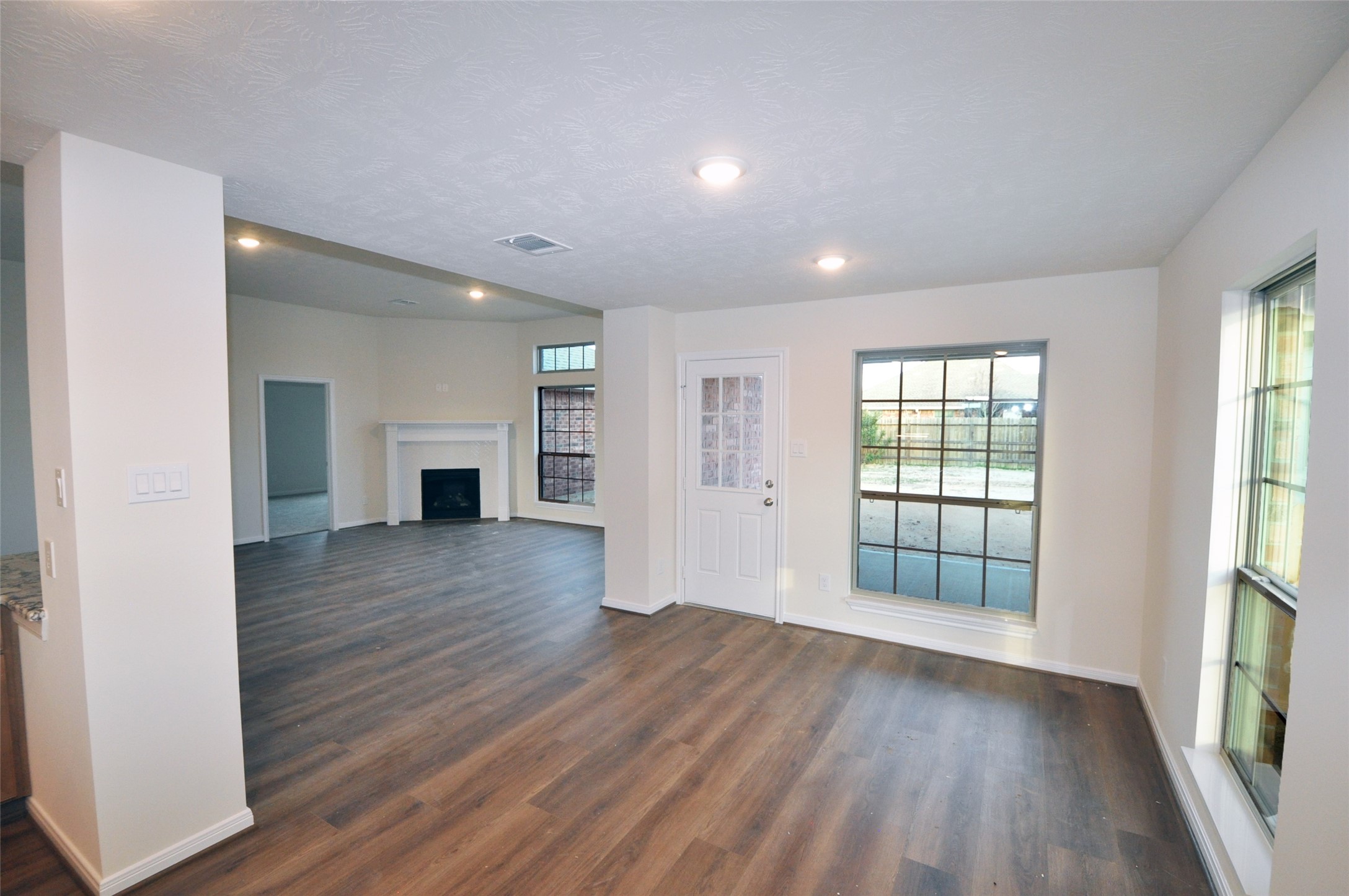 3701 Pedregal Road League City, TX 77573 - Photo 10 of 48 an empty room with wooden floor and windows