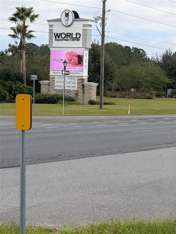 a view of a park with welcome board