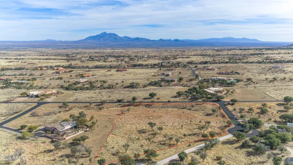 a view of ocean and mountain
