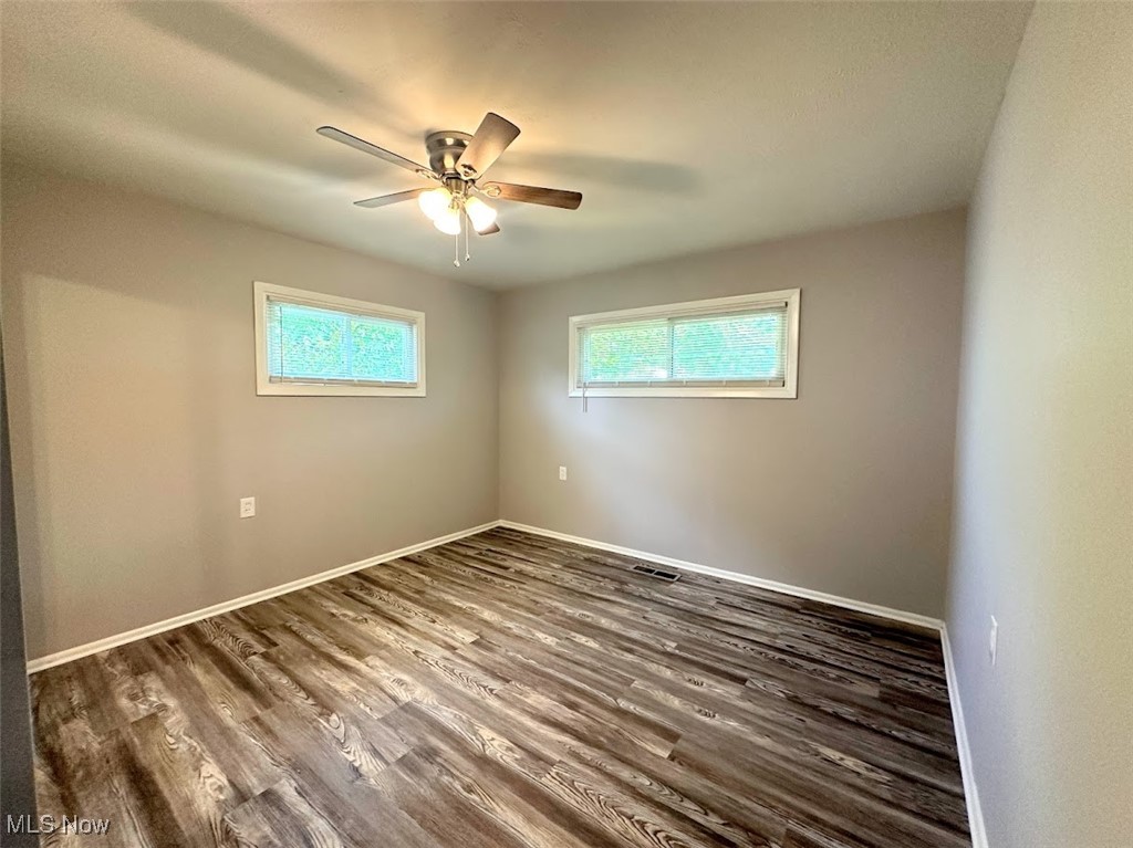 456 Nobottom Road Berea, OH 44017 - Photo 6 of 11 Spare room featuring hardwood / wood-style floors and ceiling fan