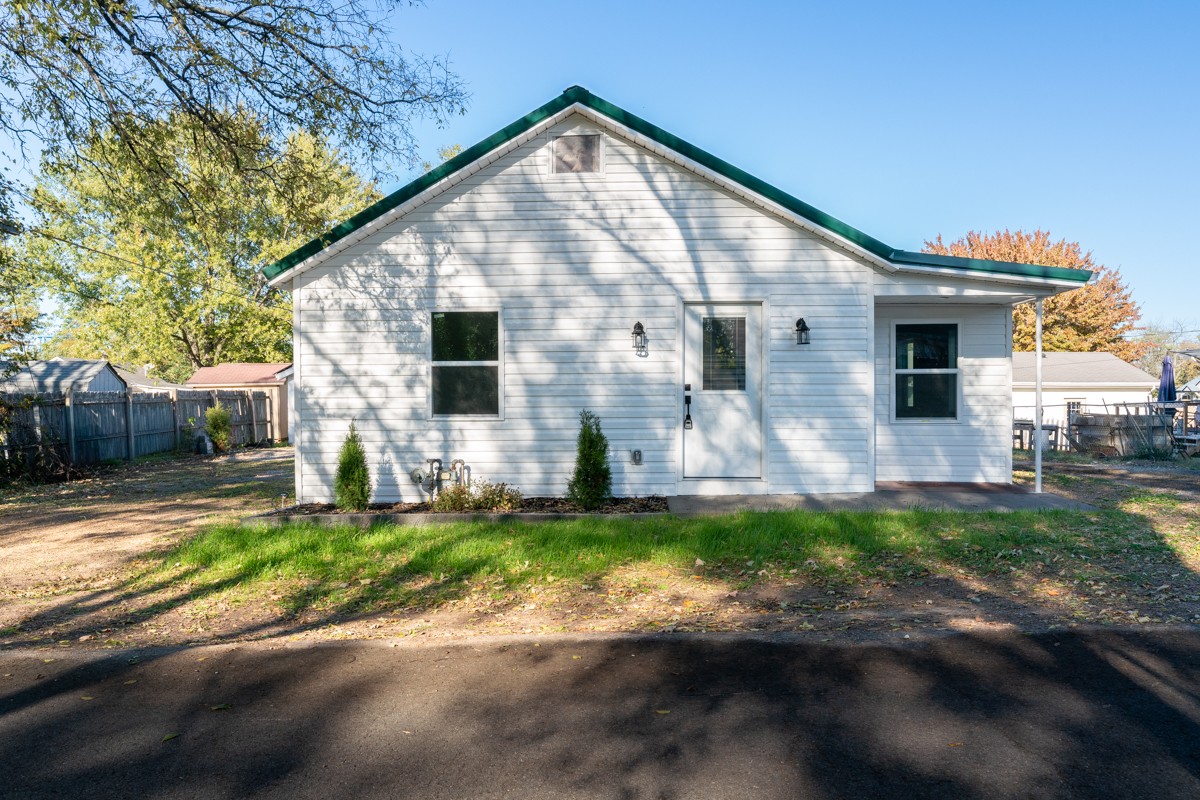 a front view of house with yard
