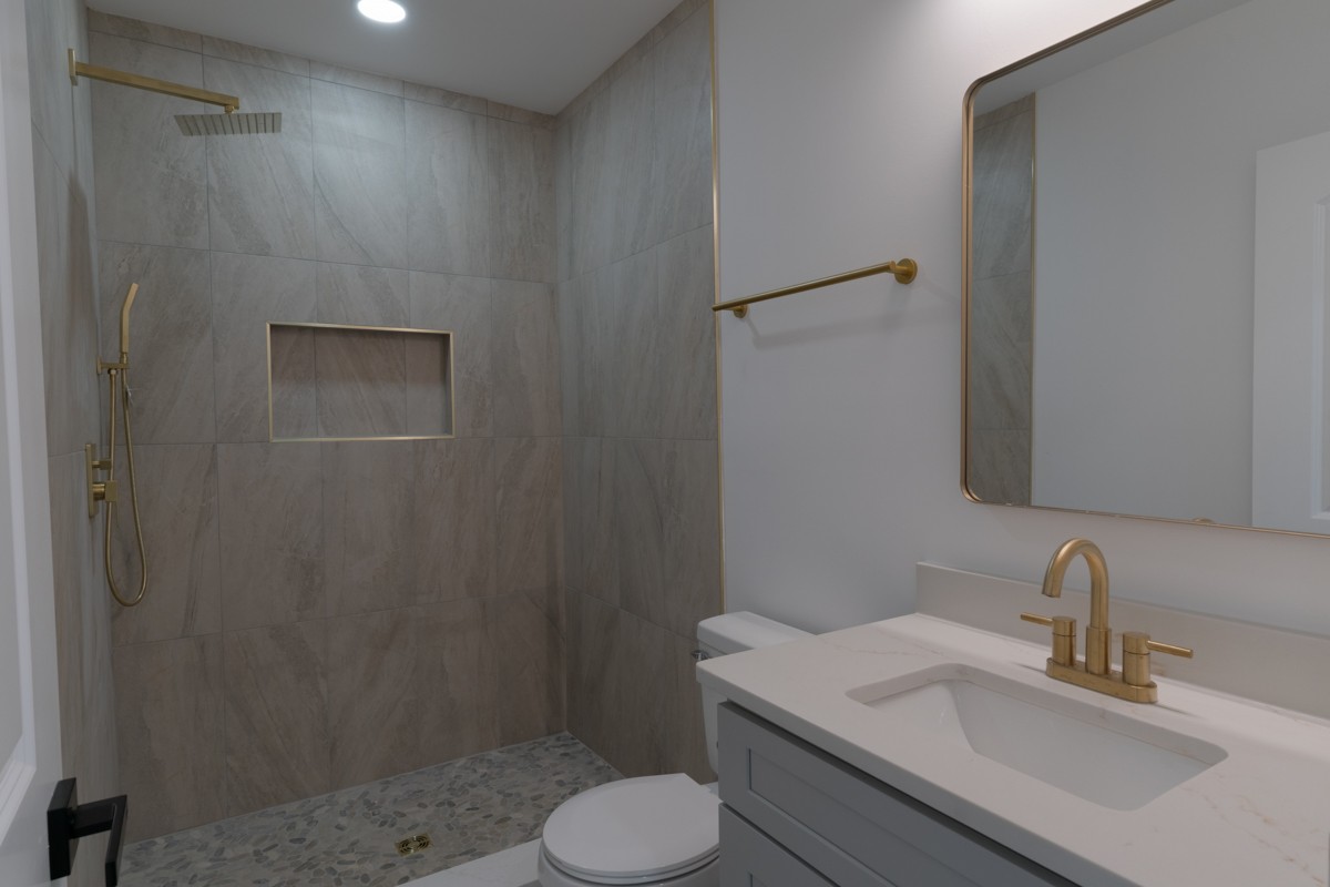 342 Crescent Drive Springfield, TN 37172 - Photo 26 of 31 a bathroom with a sink toilet and shower