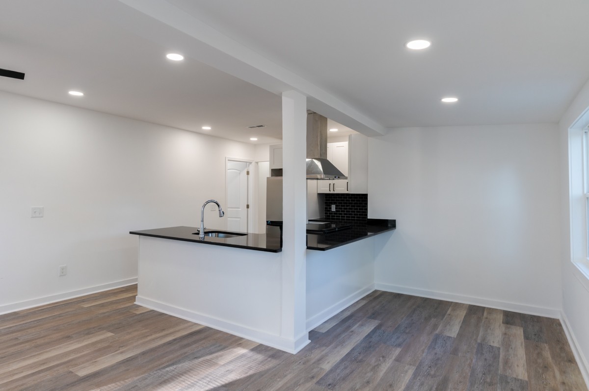 342 Crescent Drive Springfield, TN 37172 - Photo 6 of 31 a view of a hallway with wooden floor