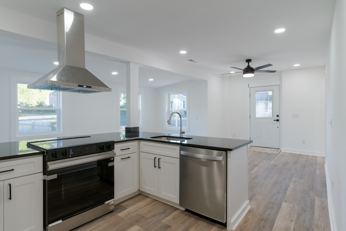 342 Crescent Drive Springfield, TN 37172 - Photo 10 of 31 a kitchen with a sink stove and cabinets