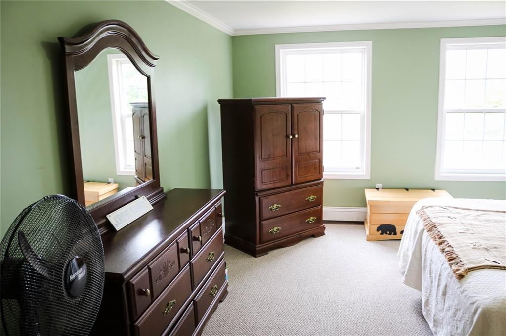 80 Horace Files Road Naples, ME 04055 - Photo 13 of 35 Master bedroom: windows overlook...