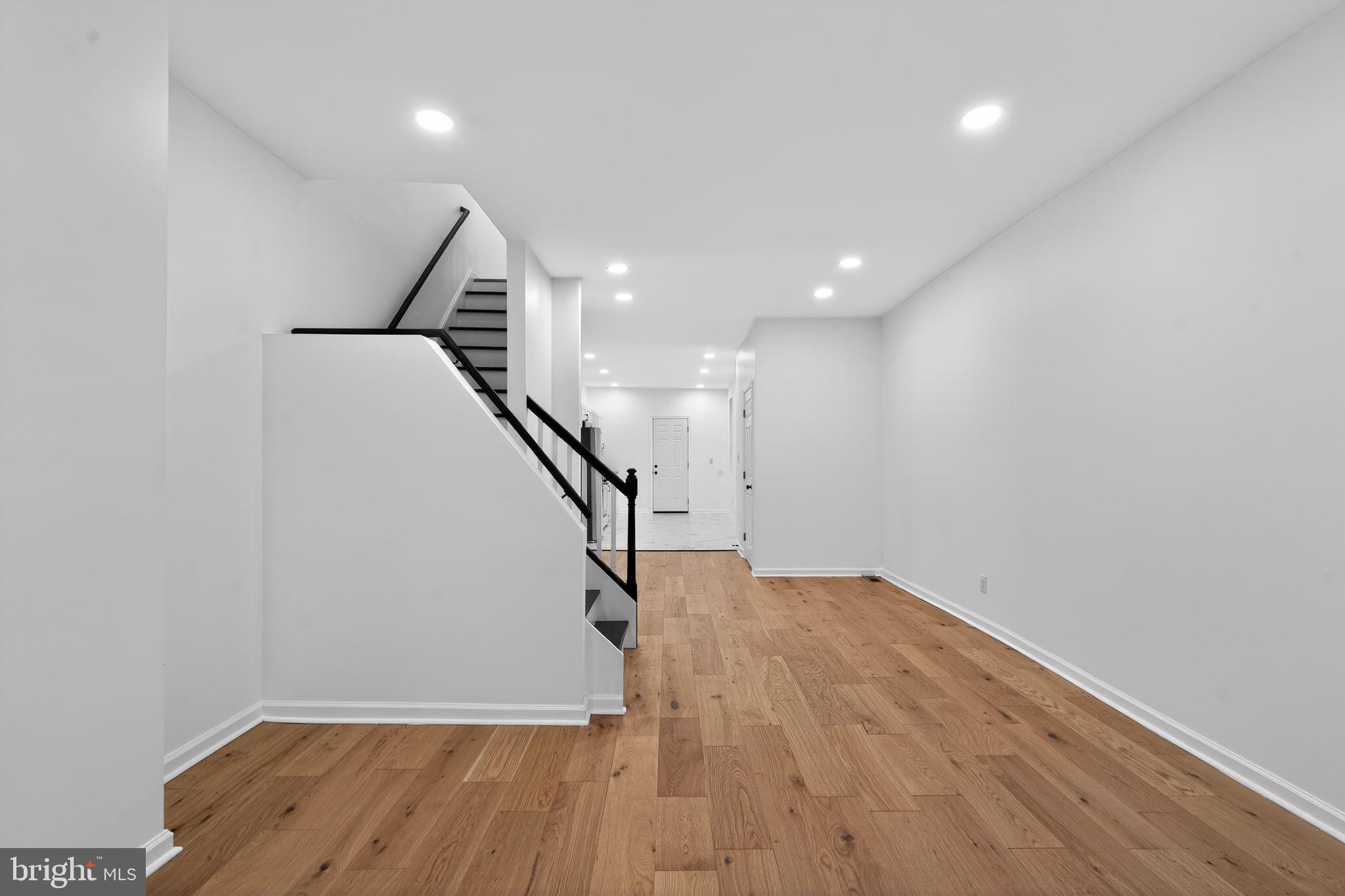 5311 Upland Street Philadelphia, PA 19143 - Photo 11 of 31 a view of entryway and hall with wooden floor
