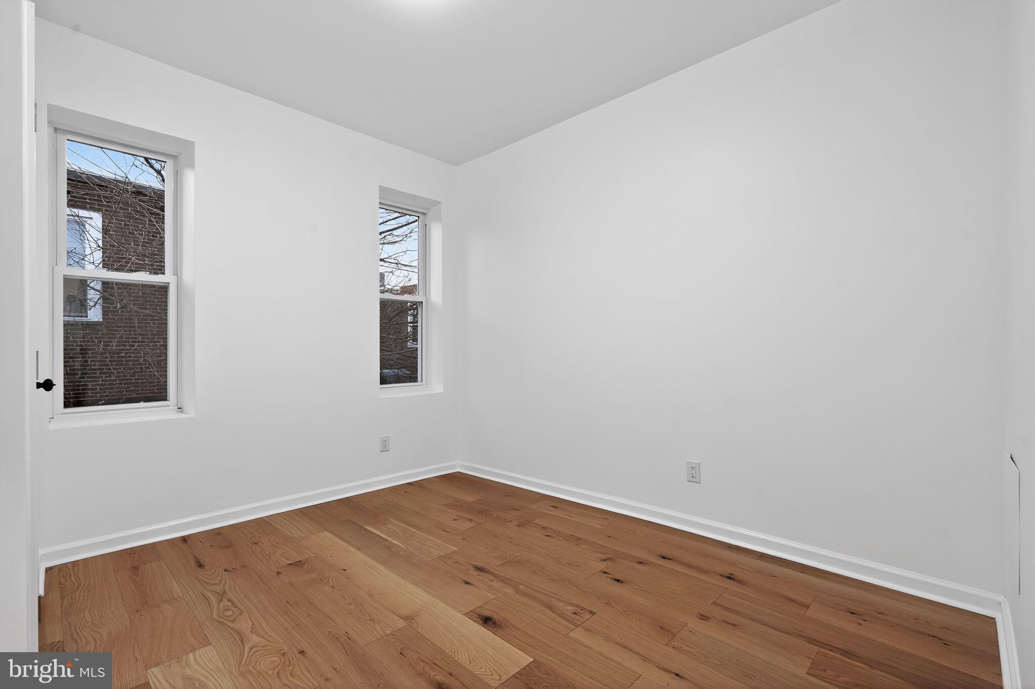 5311 Upland Street Philadelphia, PA 19143 - Photo 14 of 31 wooden floor in an empty room