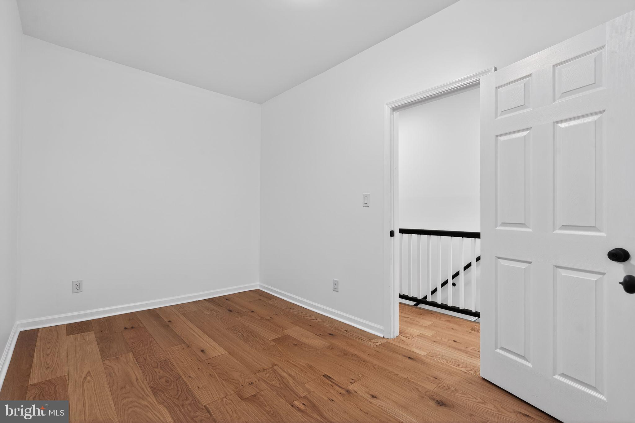 5311 Upland Street Philadelphia, PA 19143 - Photo 17 of 31 wooden floor in an empty room