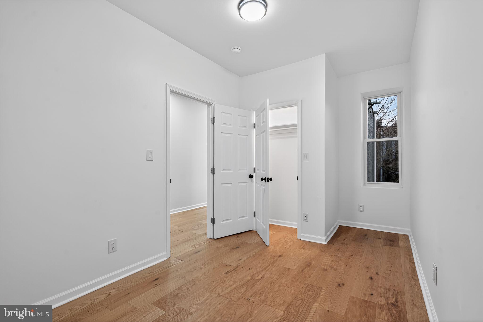 5311 Upland Street Philadelphia, PA 19143 - Photo 21 of 31 a view of empty room with wooden floor