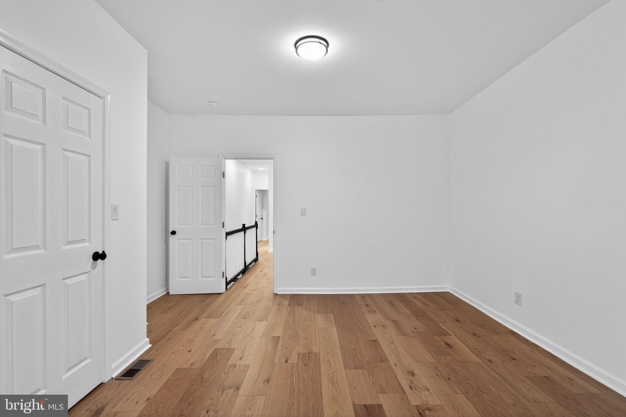 5311 Upland Street Philadelphia, PA 19143 - Photo 22 of 31 wooden floor in an empty room