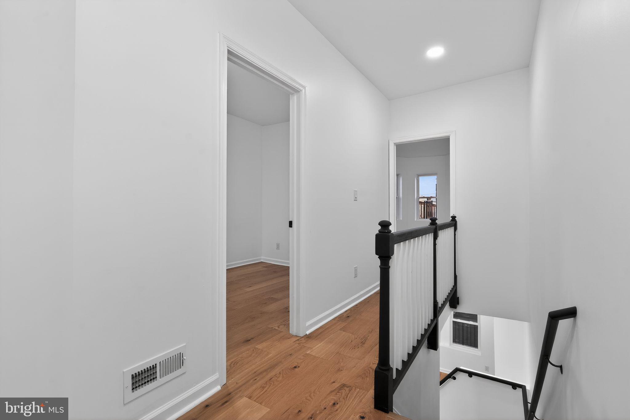 5311 Upland Street Philadelphia, PA 19143 - Photo 25 of 31 a view of a hallway with workspace
