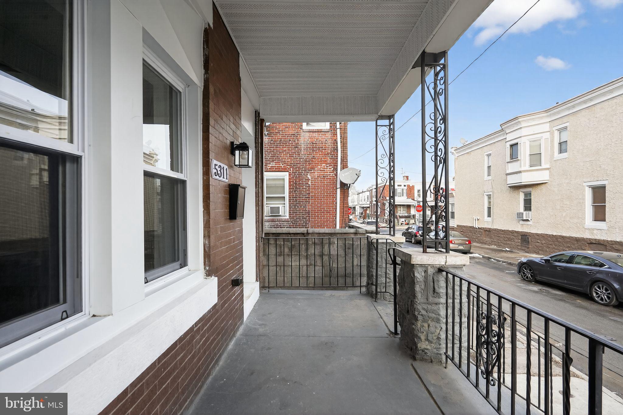 5311 Upland Street Philadelphia, PA 19143 - Photo 8 of 31 a view of balcony with couch