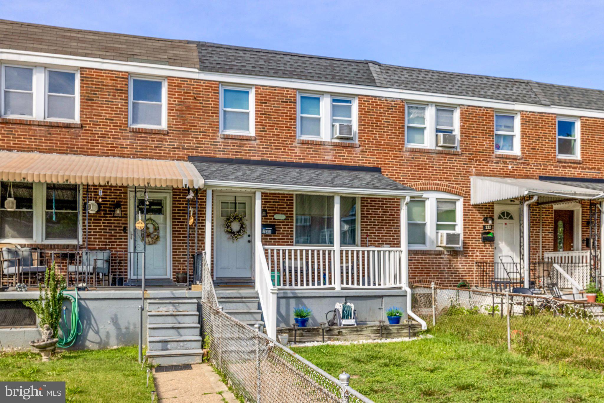 234 West Edgevale Road Baltimore, MD 21225 - Photo 2 of 45 Charming brick townhome with porch.