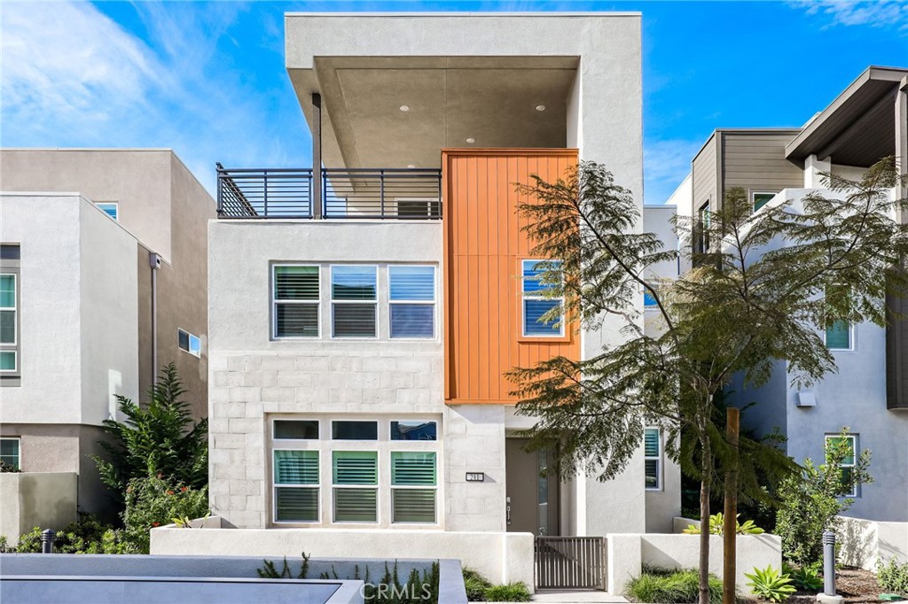 211 Chorus Irvine, CA 92618 - Photo 1 of 1 a front view of a building with a garden