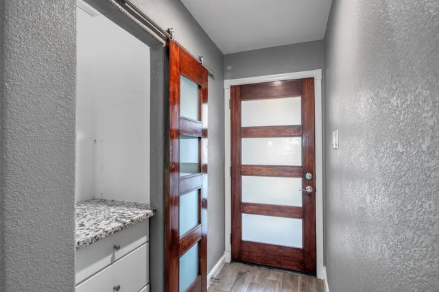 a view of an empty room and window