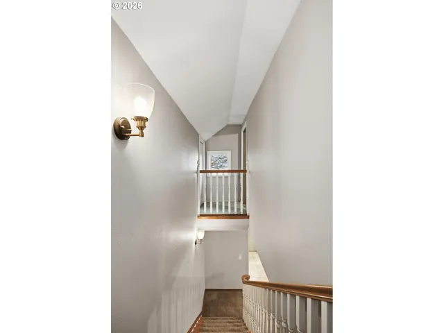 a balcony with furniture and a fireplace