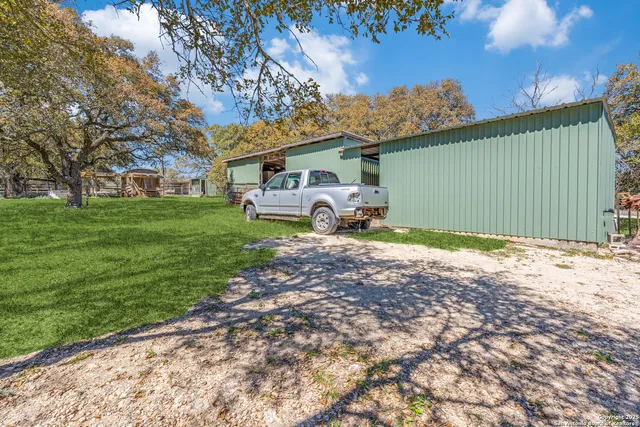 a childrens park with lots of swings and slides