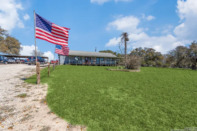 a front view of a building with garden