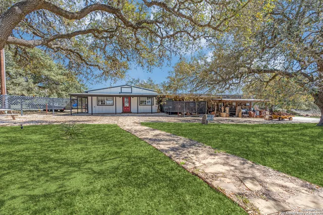a view of a golf course with a lake