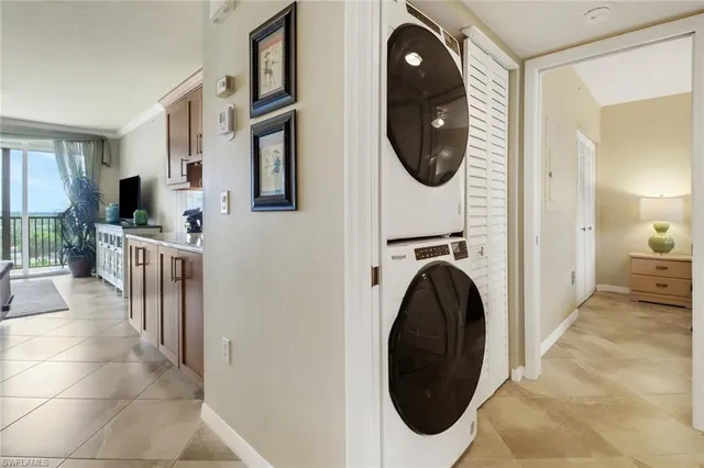 a view of a bathroom with washer and dryer