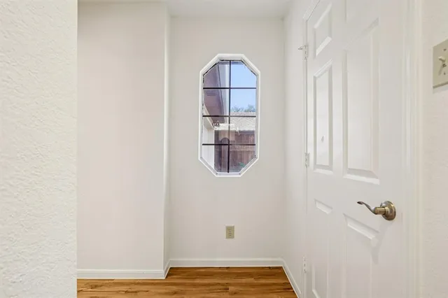 a view of wooden floor in a bathroom