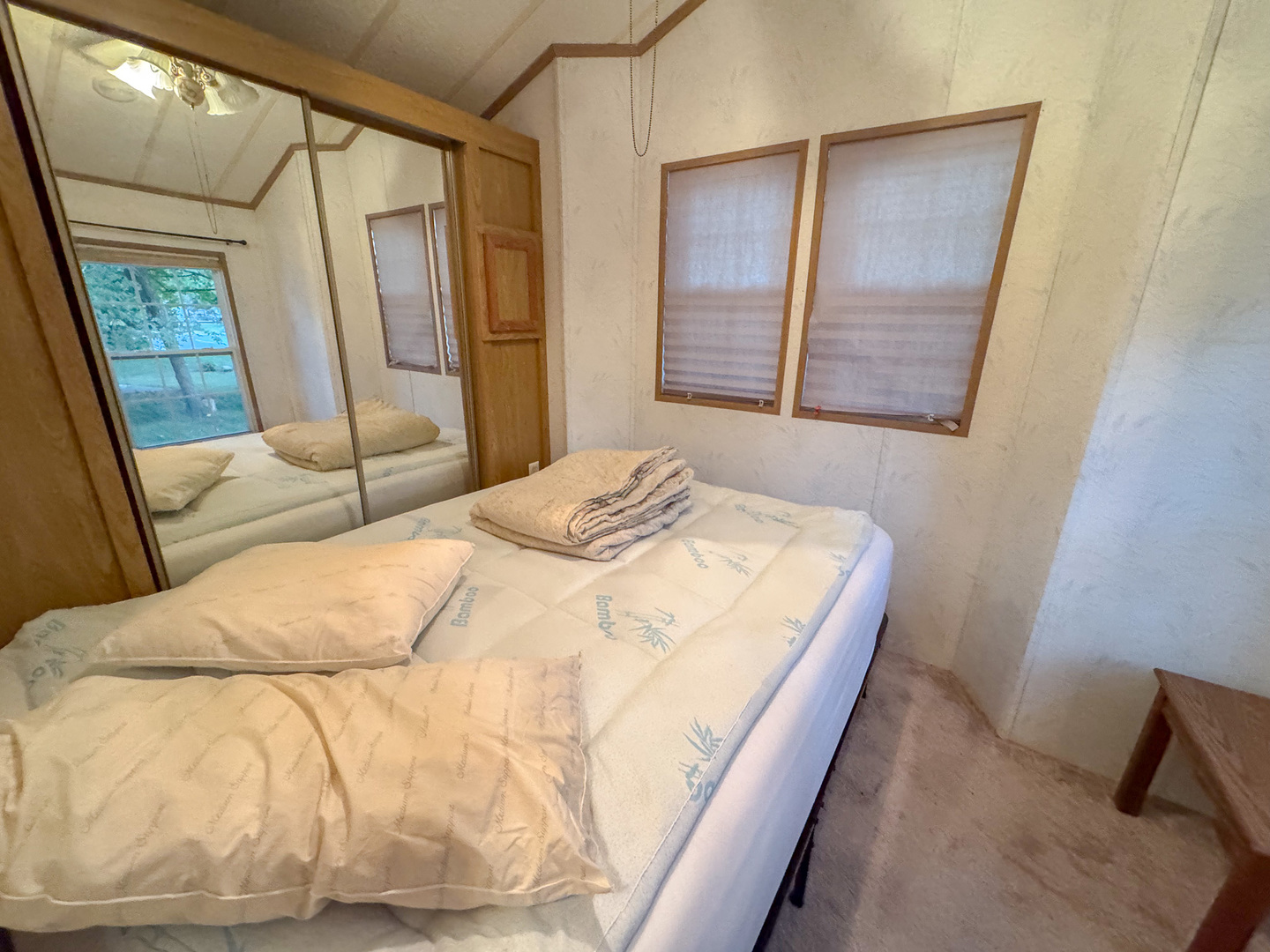 29-140 Woodhaven Sublette, IL 61367 - Photo 15 of 20 a bedroom with a bed and a mirror