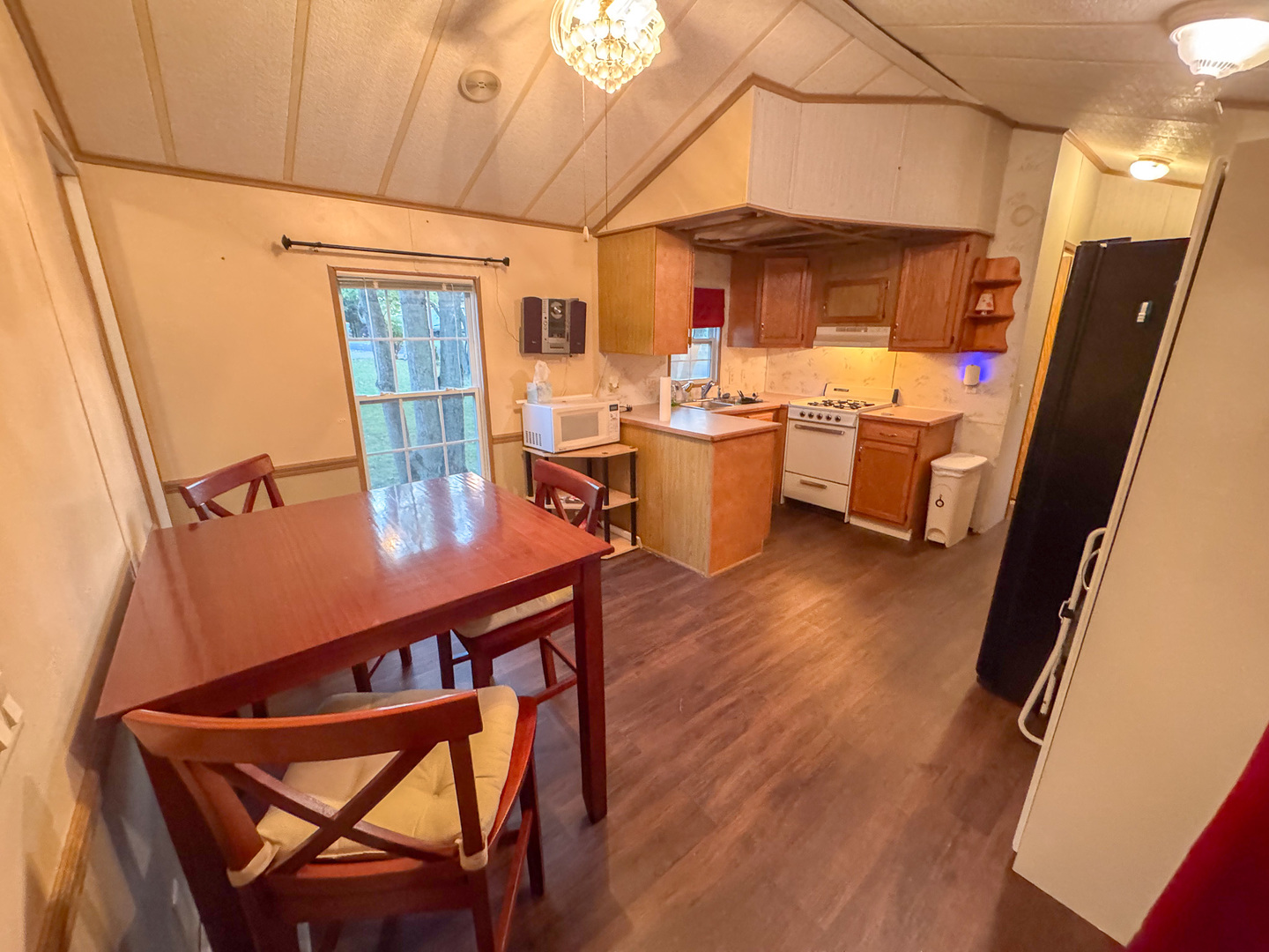 29-140 Woodhaven Sublette, IL 61367 - Photo 10 of 20 a view of a dining room with furniture window and wooden floor